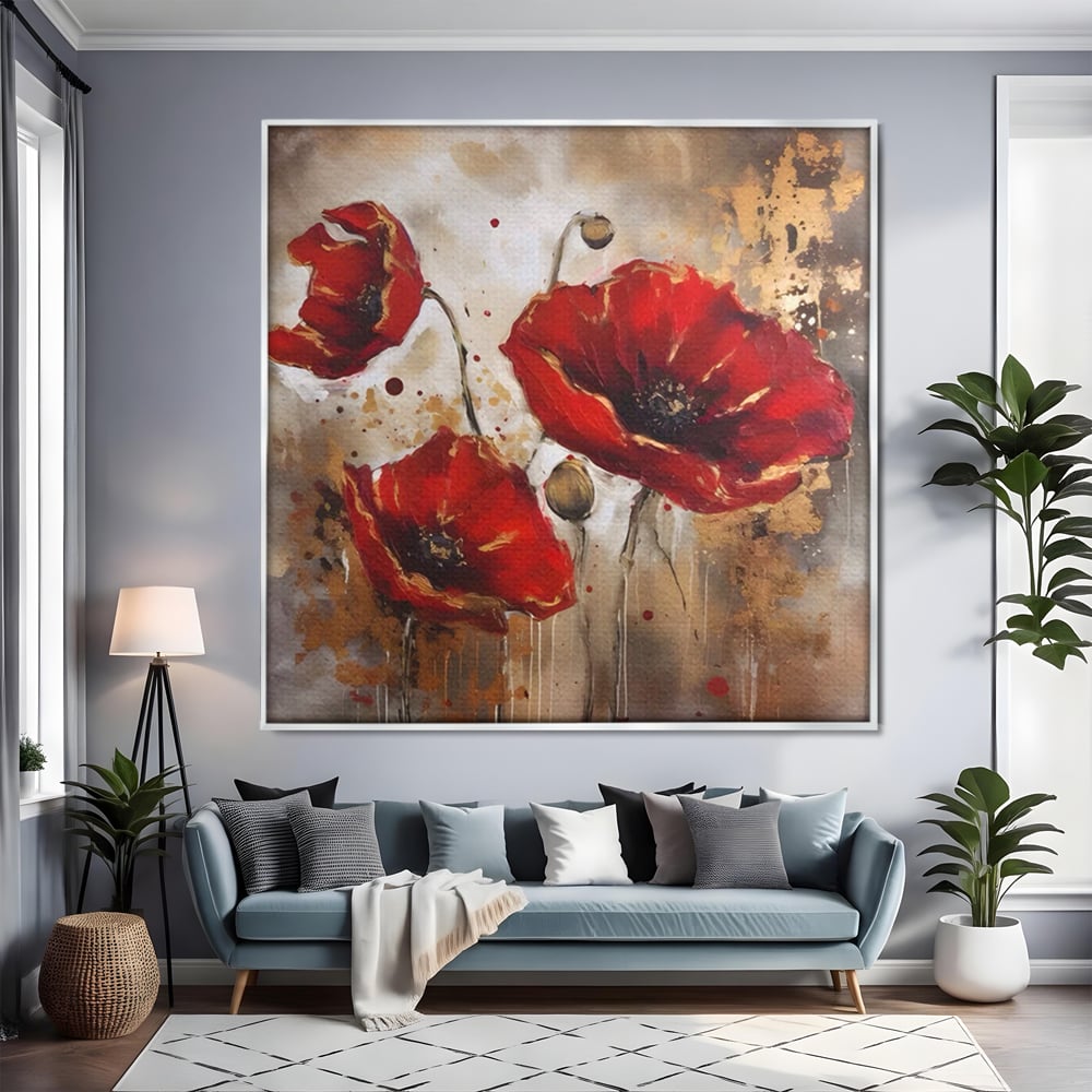 Tablou canvas cu pictura decorativa cu maci rosii, in rama de aluminiu argintiu, pe perete intr-un living